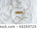 thank you craft brown tag and recycle craft wire on white crumpled paper with copy space , idea for background, banner 68269729