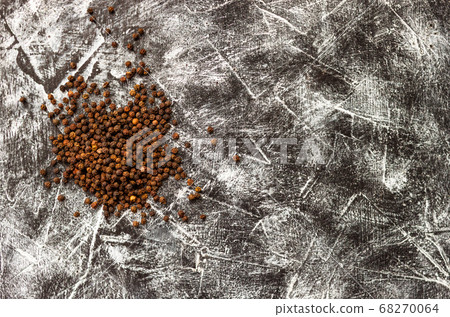 Black pepper seeds pile on black and white Black pepper seeds pile on black and white 68270064