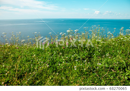 Beautiful landscape scenery cliff meadow, water Beautiful landscape scenery cliff meadow, water 68270065