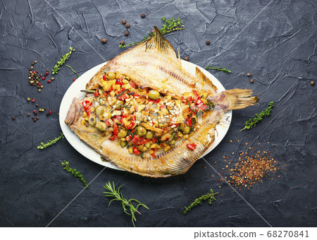Flounder with vegetables on table Flounder with vegetables on table 68270841