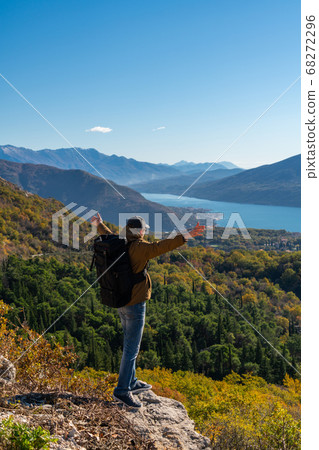 A traveler with a backpack  68272296