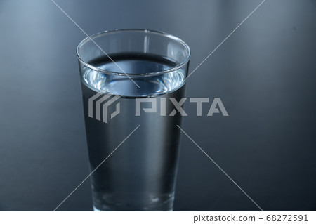 Glass of water black background Glass of water black background 68272591