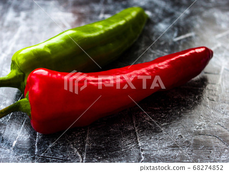 Red, green cayenne hot chili pepper on black, Red, green cayenne hot chili pepper on black, 68274852