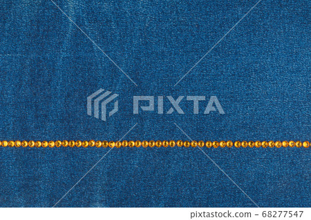 Luxury fashionable background. Line of yellow rhinestones Luxury fashionable background. Line of yellow rhinestones 68277547