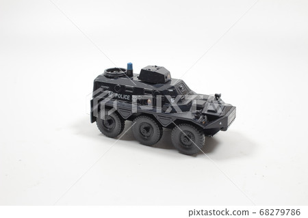 Scale police car model with figure at the white Scale police car model with figure at the white 68279786