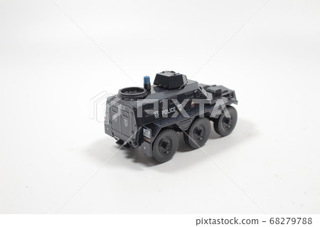 Scale police car model with figure at the white Scale police car model with figure at the white 68279788
