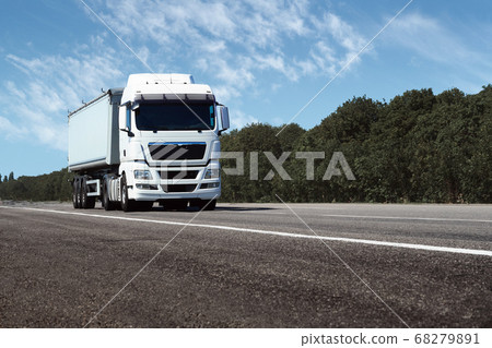 truck on the road, front view, empty space on a 68279891