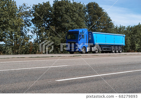 truck on the road, side view, empty space on a 68279893