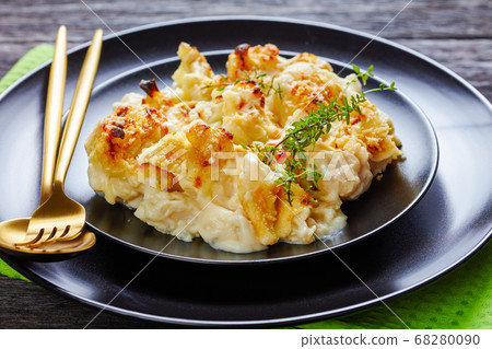 Australian side dish cauliflower cheese on a plate Australian side dish cauliflower cheese on a plate 68280090