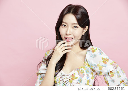 Beautiful flowers on green background 68283261