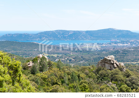 Landscape shot with green forests, mountains and a 68283521