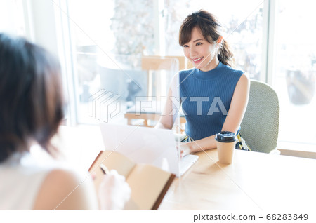 A woman having a meeting over the shield 68283849