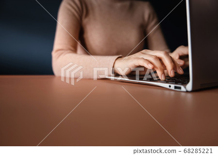 Young Woman Working on Computer Laptop. Closeup 68285221