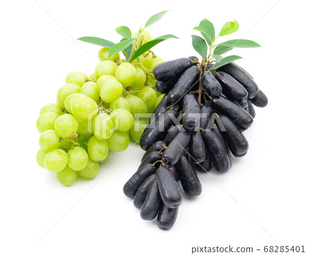 Fresh grape green and black on a white background Fresh grape green and black on a white background 68285401