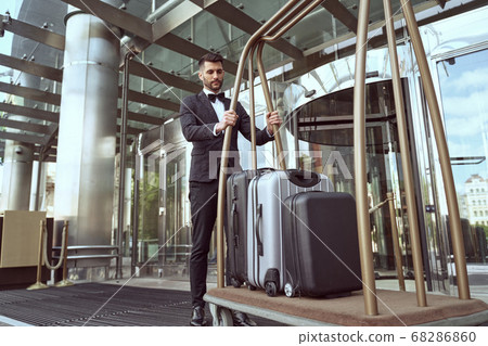 Taking care of guests luggage is porters primary duty Taking care of guests luggage is porters primary duty 68286860