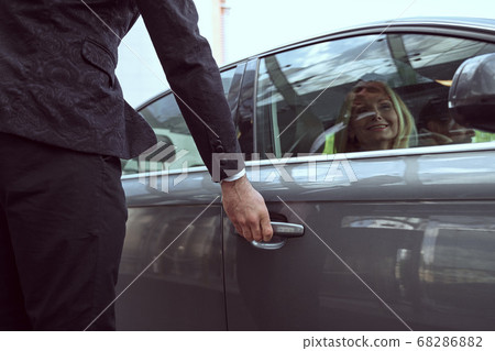 Please allow me get that door for your convenience 68286882