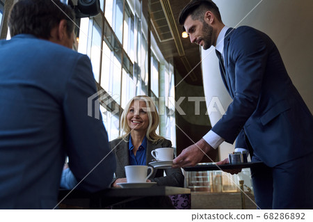 Excellent customer service delivered by hotel bar staff Excellent customer service delivered by hotel bar staff 68286892