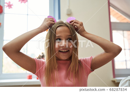 Merry pretty little lady during art lesson Merry pretty little lady during art lesson 68287834