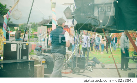 Blurred film set equipment and crew 68288843