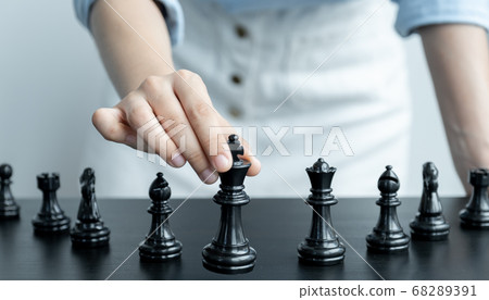 hand move chess with strategy and tactic to win enemy, play battle on board game 68289391