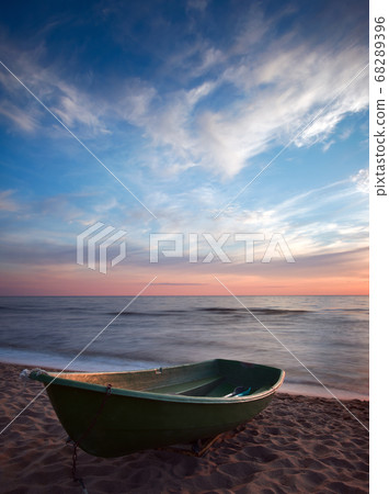Sunset.Boat on coast. Sunset.Boat on coast. 68289396