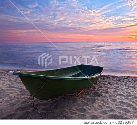 Sunset.Boat on coast. Sunset.Boat on coast. 68289397