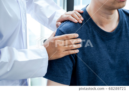 Physical therapy is doing shoulder and elbow therapy for patients in the hospital 68289721