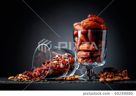 Dates and dried fruits, nuts and seeds. Dates and dried fruits, nuts and seeds. 68289880