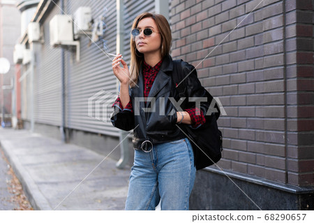 Beautiful young stylishly dressed Caucasian girl Beautiful young stylishly dressed Caucasian girl 68290657