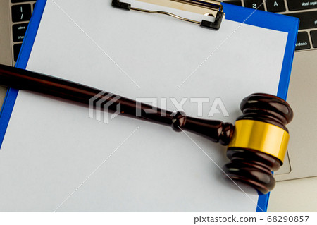 An empty application form of document and wooden gavel isolated. 68290857