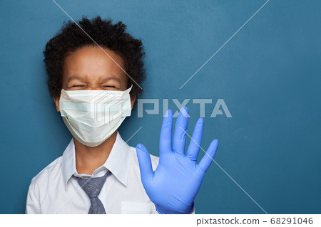 Funny black child in protective medical face mask 68291046
