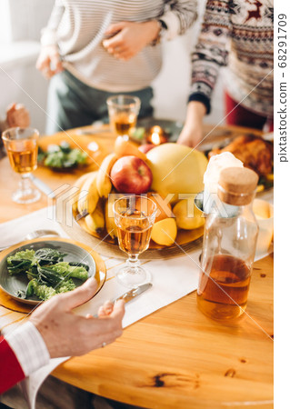 people standing near the table with food people standing near the table with food 68291709