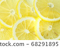 Background from bright juicy sliced lemon slices. 68291895