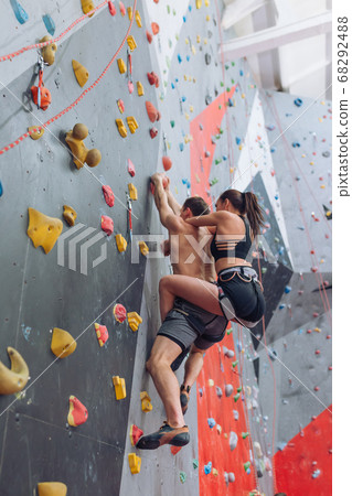 ambitious couple trying to reach the goal together 68292488