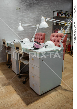 Nail and pedicure saloon modern with nail polish colorful in a row on white background. 68292569