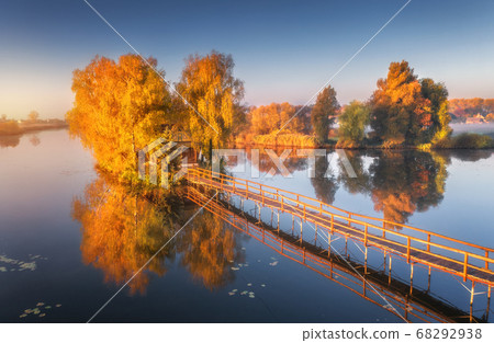 Old fisherman house and wooden pier at sunrise in 68292938