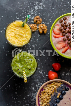 top view shot. blended tasty drink from bananas, pineapples and top view shot. blended tasty drink from bananas, pineapples and 68293353