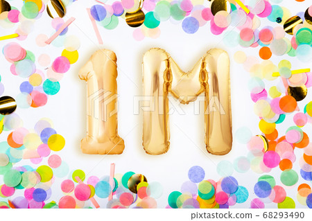 One million followers concept made of golden inflatable balloons in the frame of colorful confetti on white background. 68293490