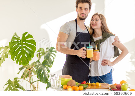 pleasant fair-haired girl is looking at her boyfriend pleasant fair-haired girl is looking at her boyfriend 68293669