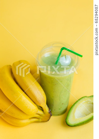 green cocktail from bananas and avocado 68294087