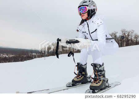 attractive fit girl enjoys skiing attractive fit girl enjoys skiing 68295290