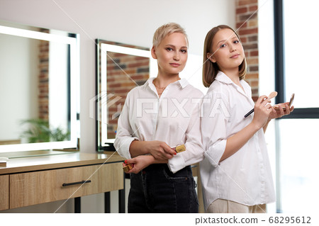 portrait of confident make-up artists in beauty studio 68295612