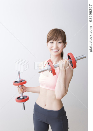 Women doing weight training Women doing weight training 68296297