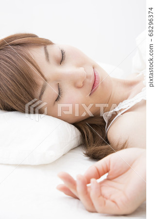 woman sleeping in bed woman sleeping in bed 68296374