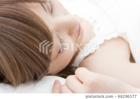 woman sleeping in bed woman sleeping in bed 68296377