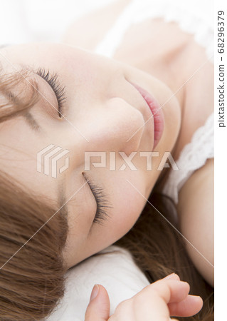 woman sleeping in bed woman sleeping in bed 68296379