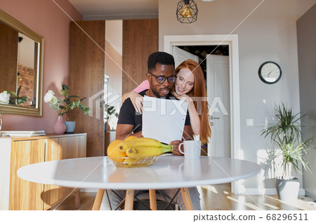 lovely diverse man and woman check documents lovely diverse man and woman check documents 68296511