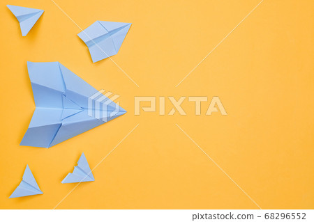 minimalism blue paper planes on a yellow background. travel, flight, flat layer, copy space one 68296552