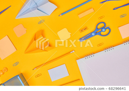 minimalism yellow-blue stationery on yellow background school, university, flat layer one minimalism yellow-blue stationery on yellow background school, university, flat layer one 68296641