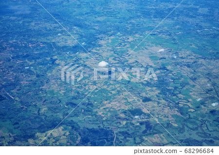Alone white cloud on green field background Alone white cloud on green field background 68296684